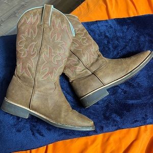 Brown cowboy boots with red blue and yellow design